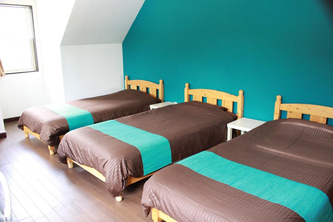Nangoku Lodge Booya Onna Bagian luar foto